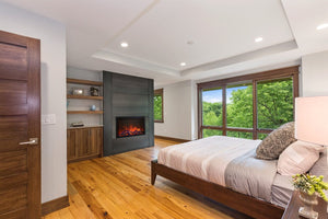 Amantii TRD Bespoke electric fireplace shown in a bedroom