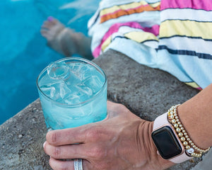 Scotsman Brilliance cuber luxury outdoor ice machine showing the cubes in a drink by the pool