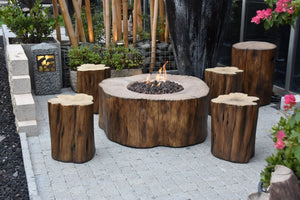 elementi manchester tree stump fire pit with tank cover and seats on a patio