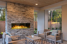 Load image into Gallery viewer, Majestic Lanai 60 fireplace on a covered patio with flames and fireglass