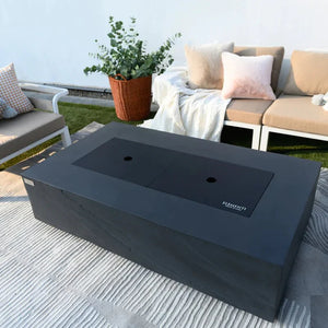 elementi cape town fire pit with lid in a patio setting