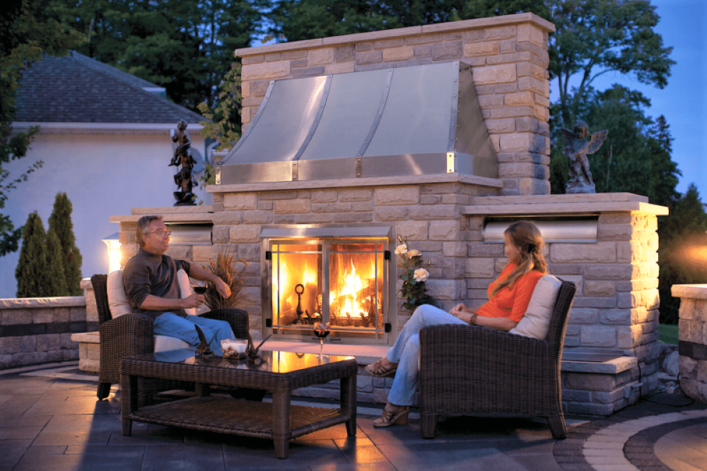 Napoleon Riverside clean face fireplace shown on a beautiful patio