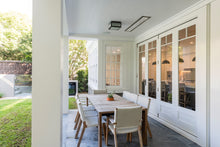Load image into Gallery viewer, Bromic electric patio heater recessed into porch ceiling