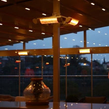 Load image into Gallery viewer, Photo in a public space with patio heaters mounted on a post