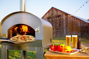 Sole Gourmet Italia pizza oven outside with a flame