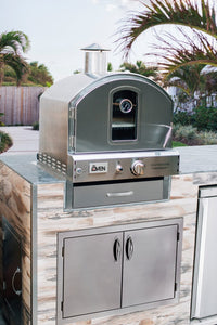 Summerset grill built in pizza oven shown built in on a patio