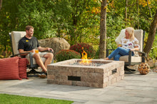 Load image into Gallery viewer, bronson fire pit kit assembled otside with a flame