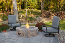 Load image into Gallery viewer, Bronson fire pit kit with a flame on a patio with outdoor greatroom swivel chairs