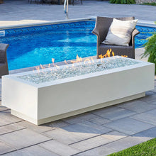Load image into Gallery viewer, The outdoor greatroom cove fir pit 72 inch. Shown on a patio with a flame